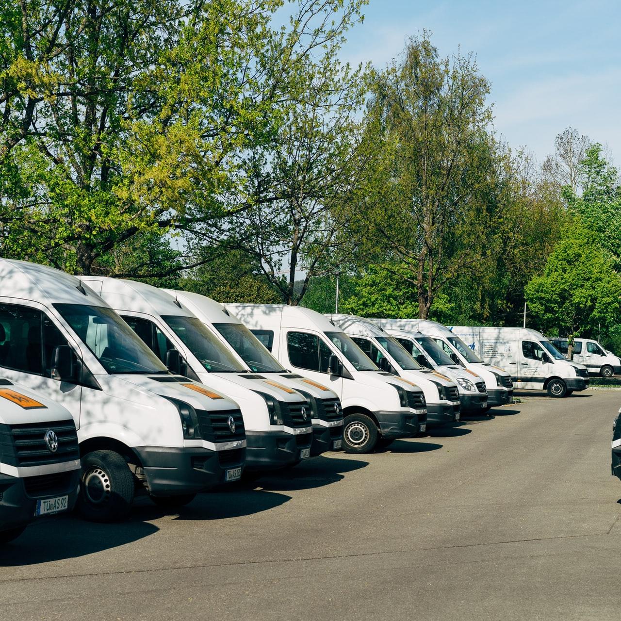 cars parked on parking lot during daytime